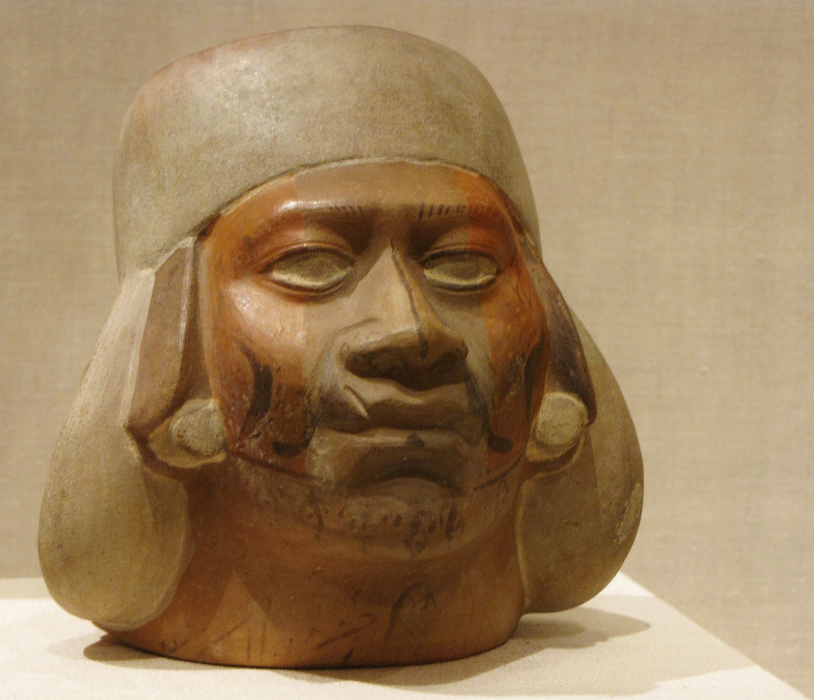 Portrait Vessel of a Young Man with a Scarred Lip, ceramic and pigment, 100 BCE/500 CE, Moche; North coast, Peru