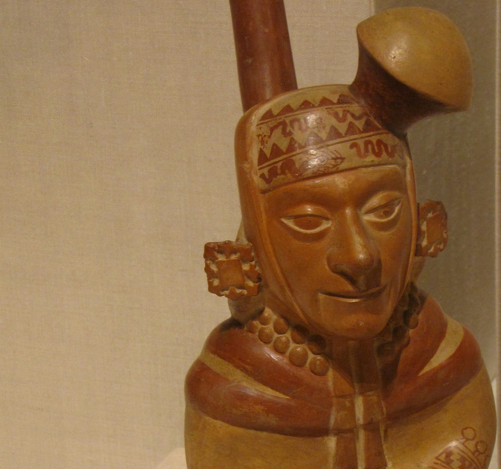 Vessel in the Form of a Courtly Musician, ceramic and pigment, 100 BCE/500 CE, Moche; North coast, Peru